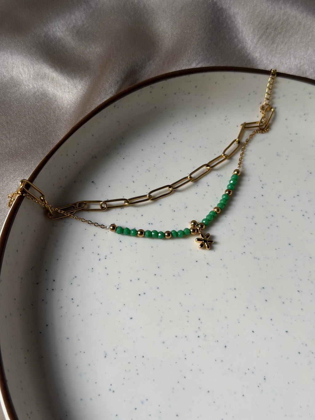 Green charm bracelet