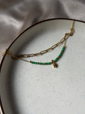 Green charm bracelet