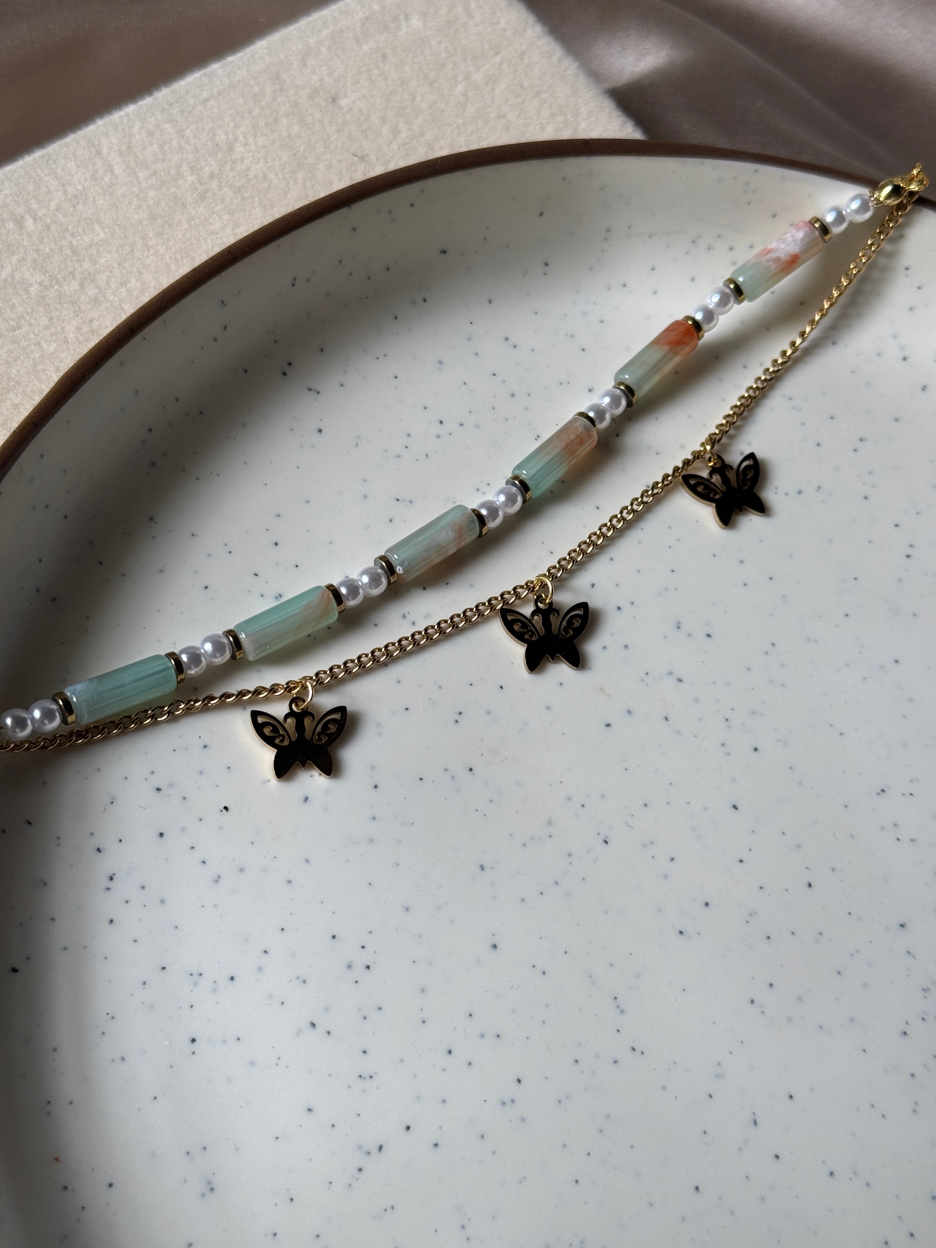 Color bead and butterfly charm bracelet