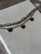 Color bead and butterfly charm bracelet