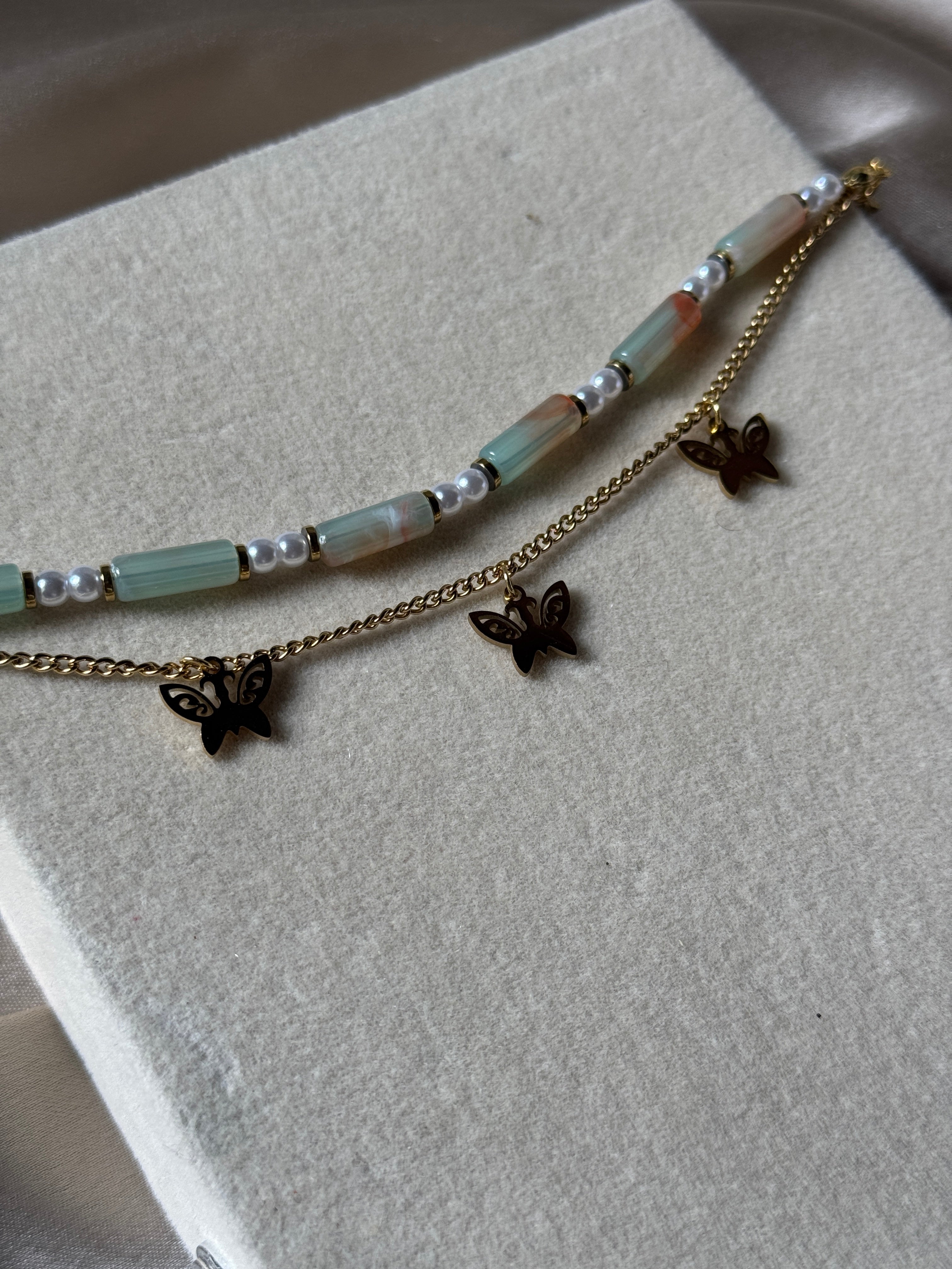 Color bead and butterfly charm bracelet