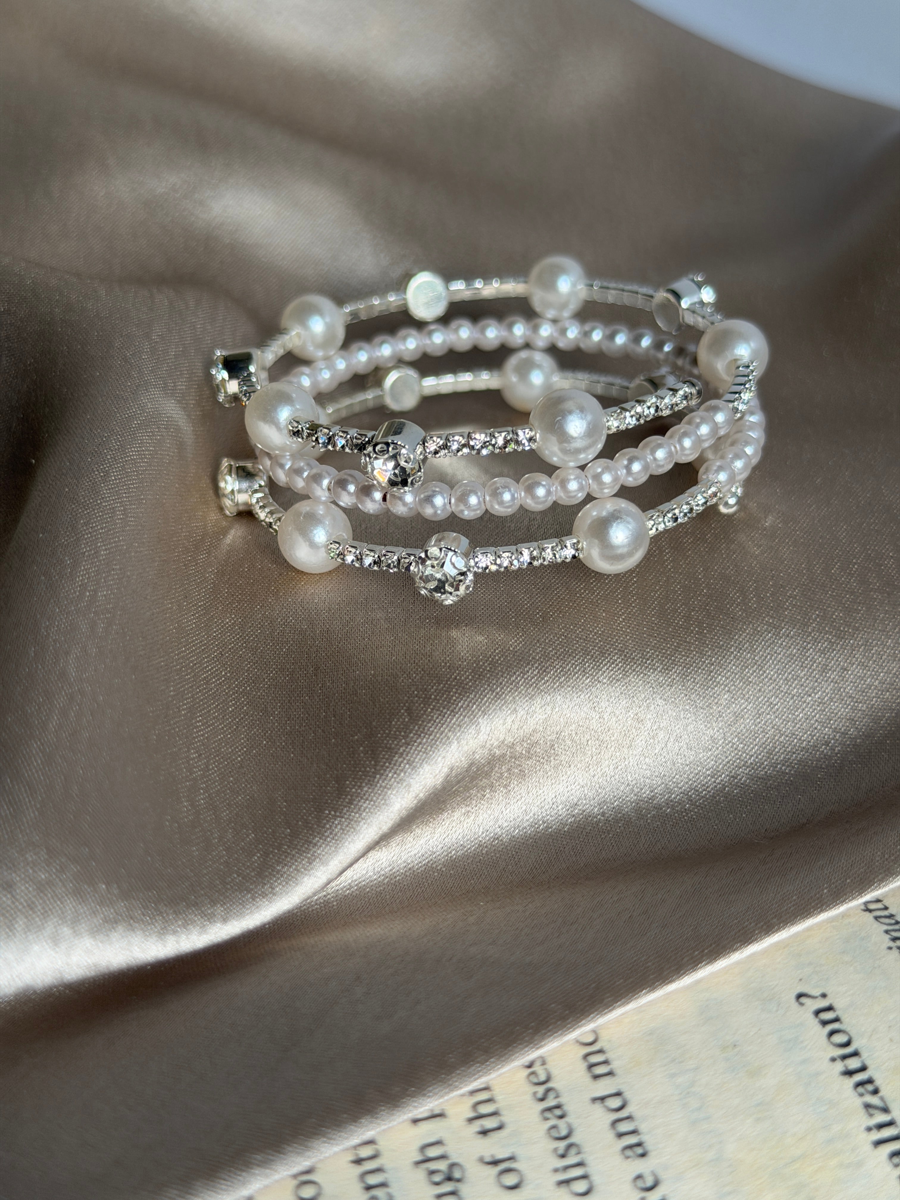Spiral pearl bangle