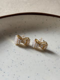 Pearl bow earring