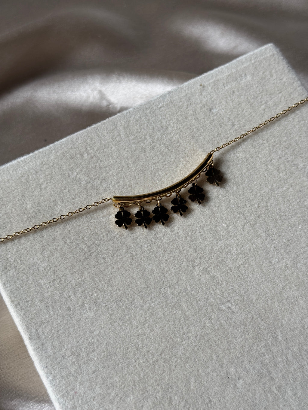 Hanging charm bracelet