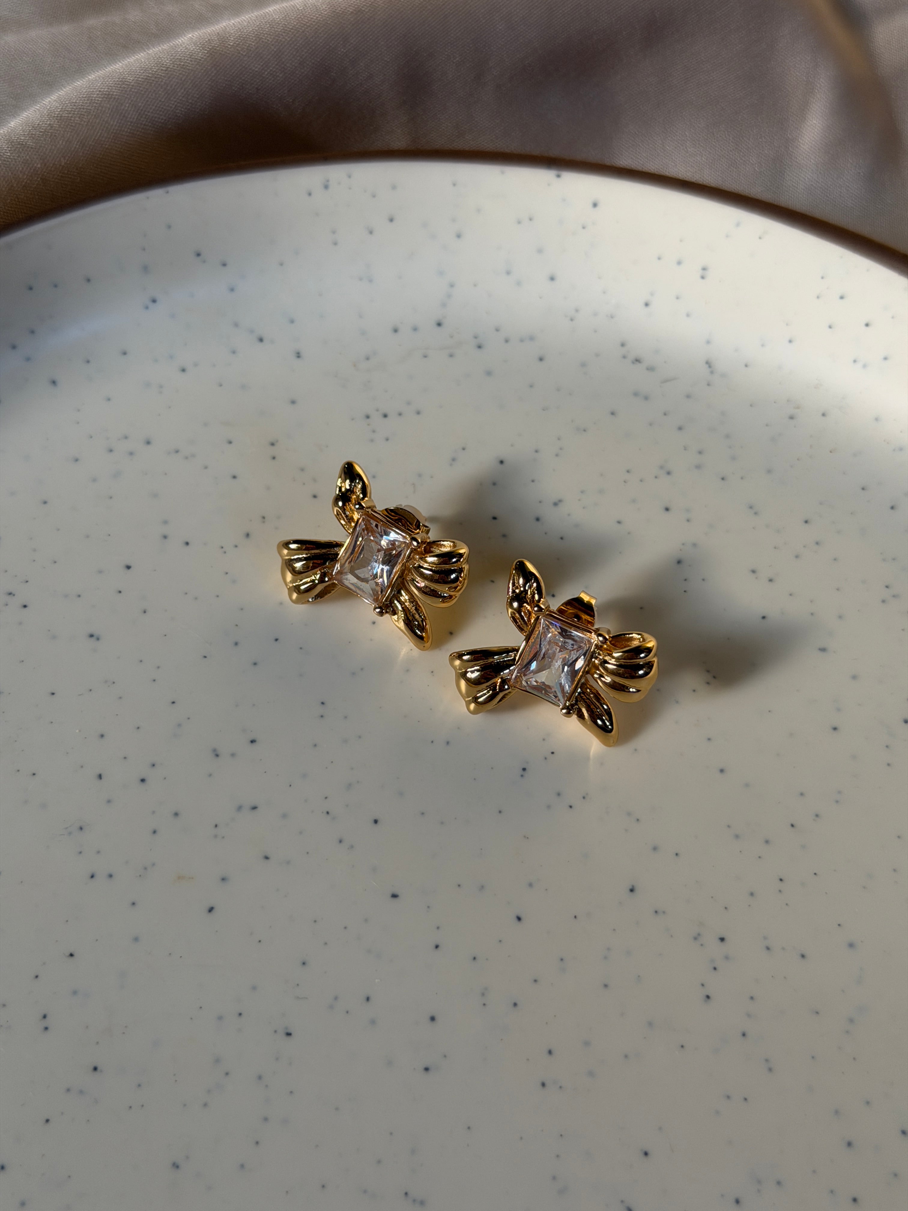 Bow spark earring